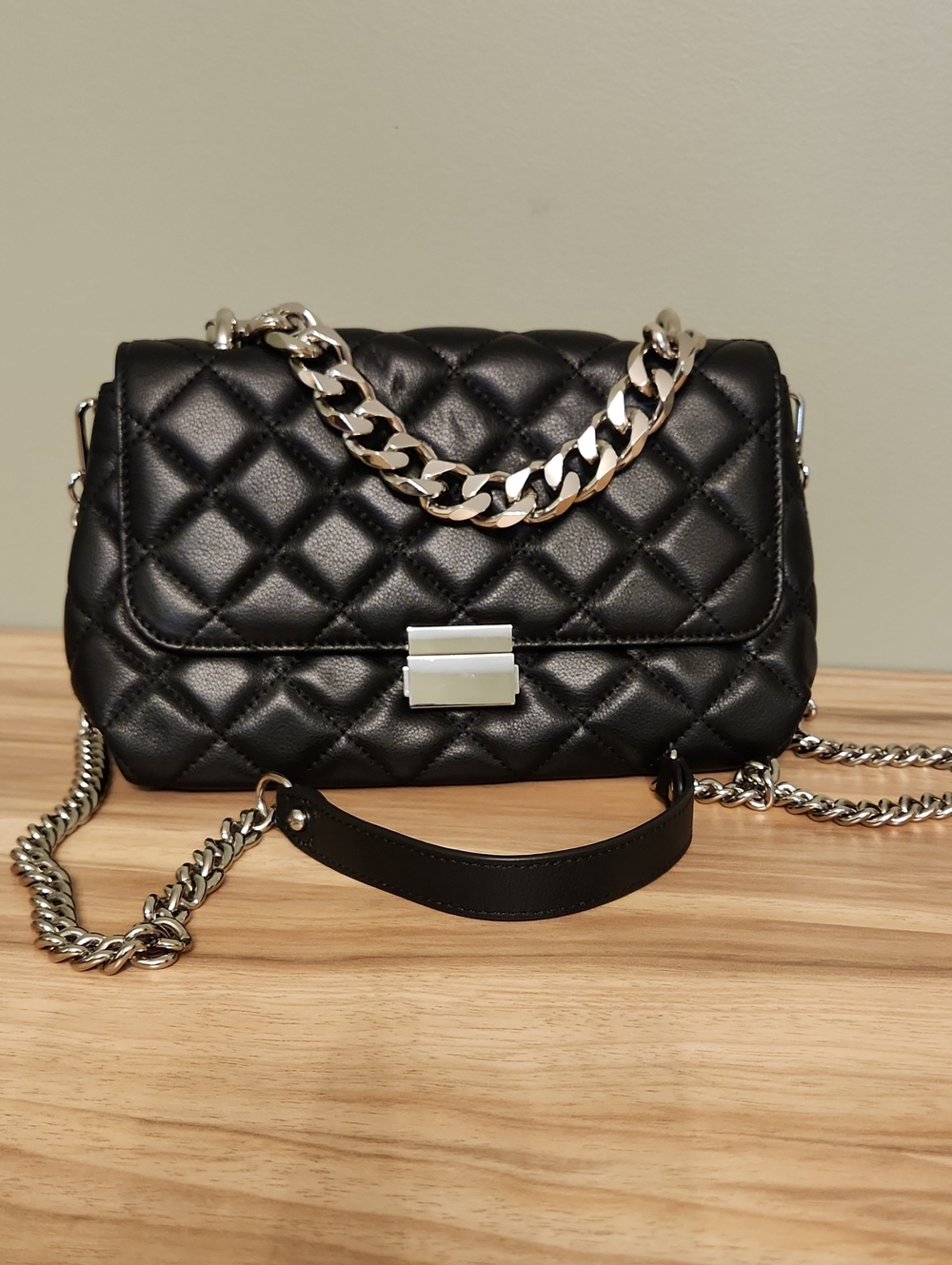 Quilted Black Shoulder Bag with Silver Chain Accent